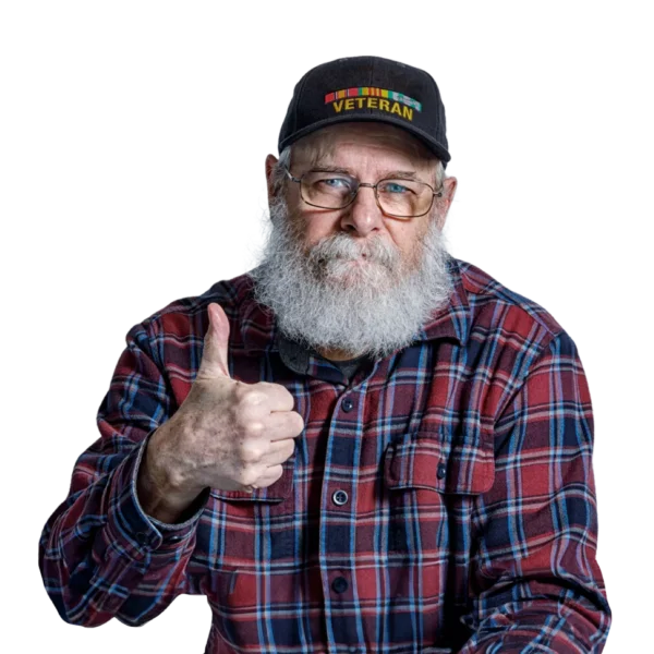 Mature gentleman with beard and Veteran cap, looking the camera with a serious face, giving a thumbs up.